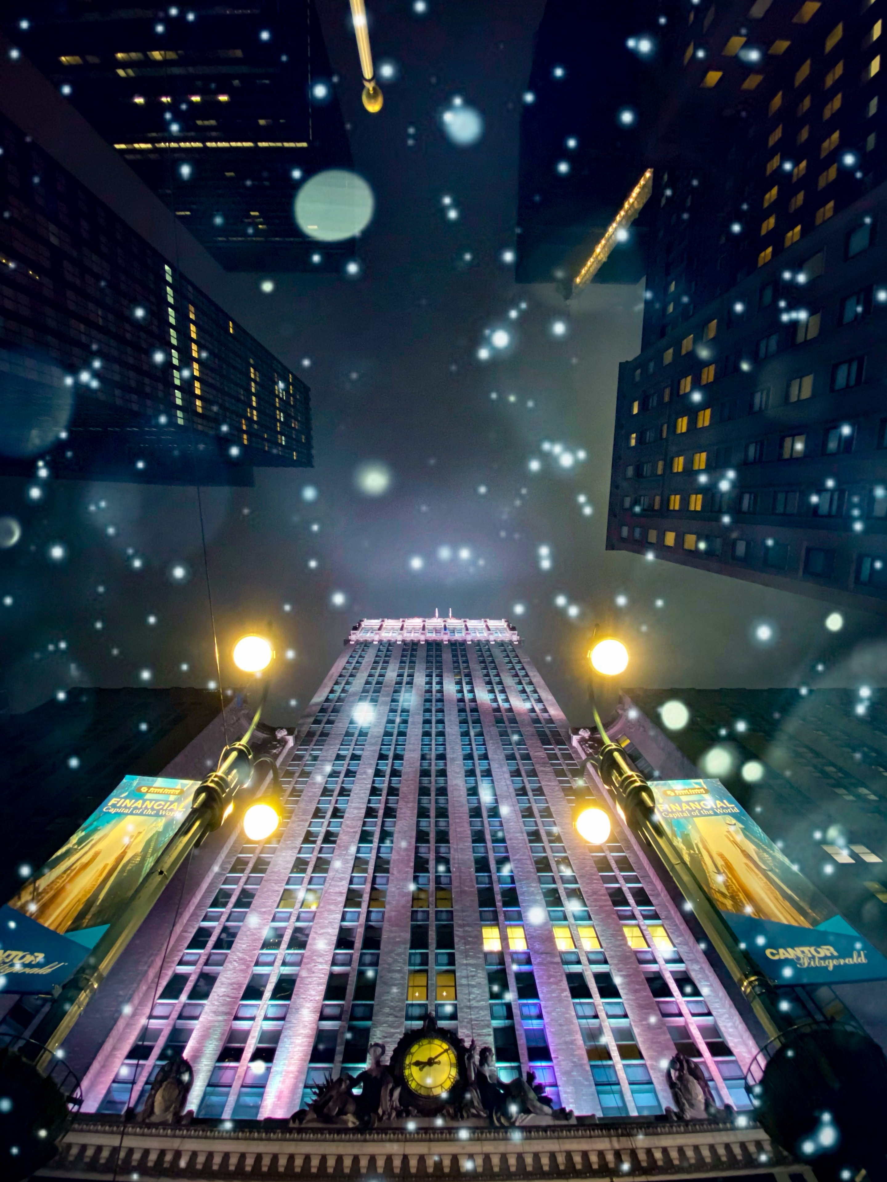 Snowy night city street upward view