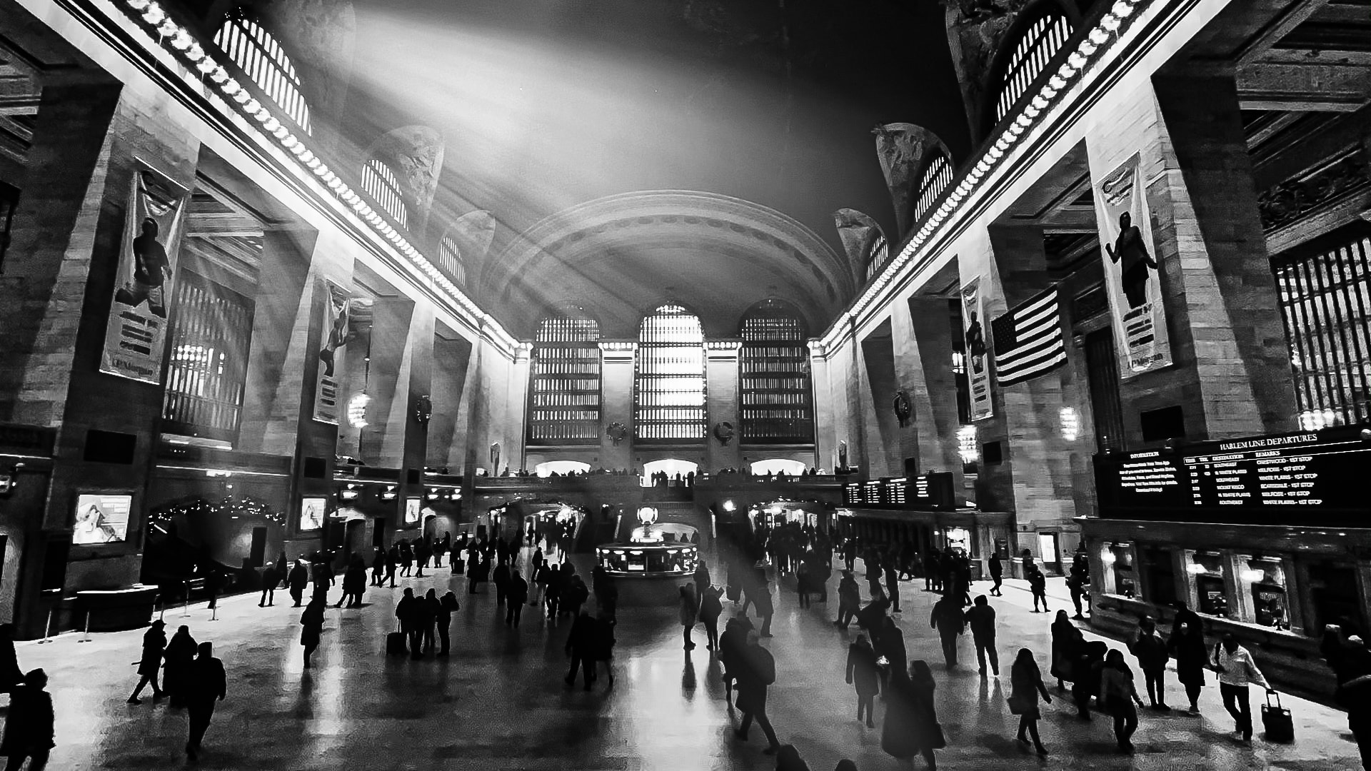 Grand Central Terminal main concourse in black and white with silhouetted crowds
