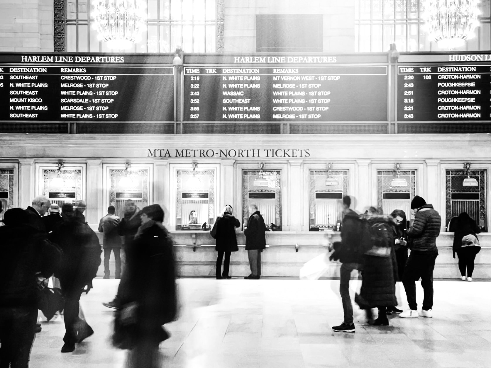 MTA Metro-North ticket hall at Grand Central with blurred commuters in motion